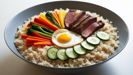 Korean Bibimbap – A mixed rice bowl with vegetables, egg, and gochujang 7 Korean Bibimbap – A mixed rice bowl with vegetables, egg, and gochujang.
