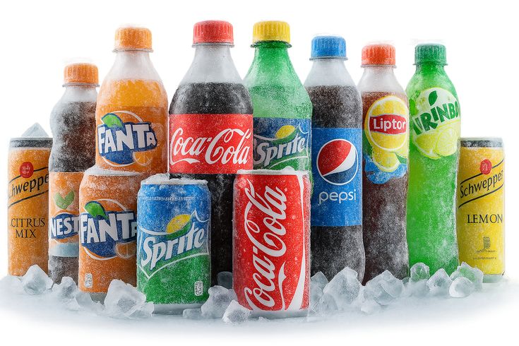Global drinks selection featuring African malt drinks, Caribbean beverages, Asian favourites, and British soft drinks on display